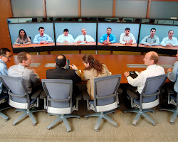 group of people collaborating on a project using video conferencing